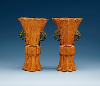 A pair of yellow-glazed vases, 17th/18th Century.