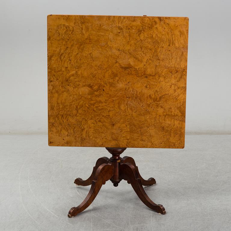 A 19th century tilt top table.