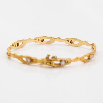 Björn Weckström, An 18K gold bracelet "Diamond pond" with diamonds ca. 0.16 ct in total. Lapponia 1974.