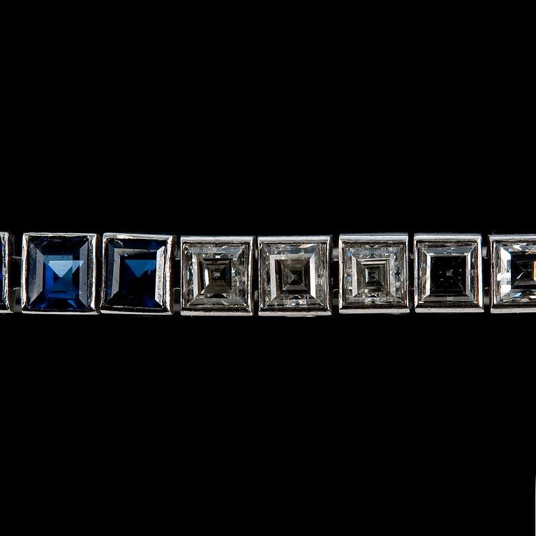 A BRACELET, square cut diamonds 10 pcs. c. 3.5 ct H/VVS, sapphires 15 pcs. c. 5.70 ct.