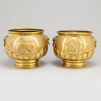 Two 19th century brass flower pots.