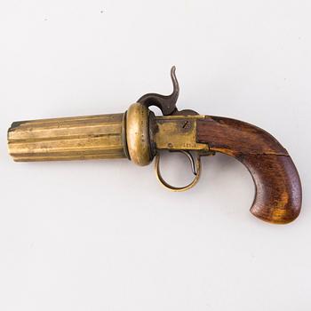 A second half of the 19th Century brass percussion revolver by Johan Engholm.