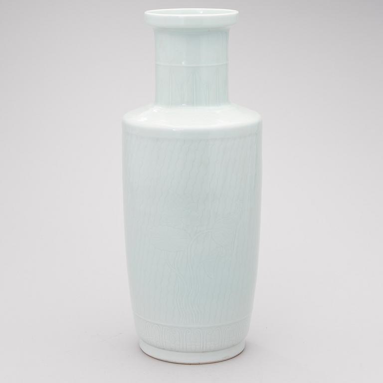 A light-green glazed ceramic vase.