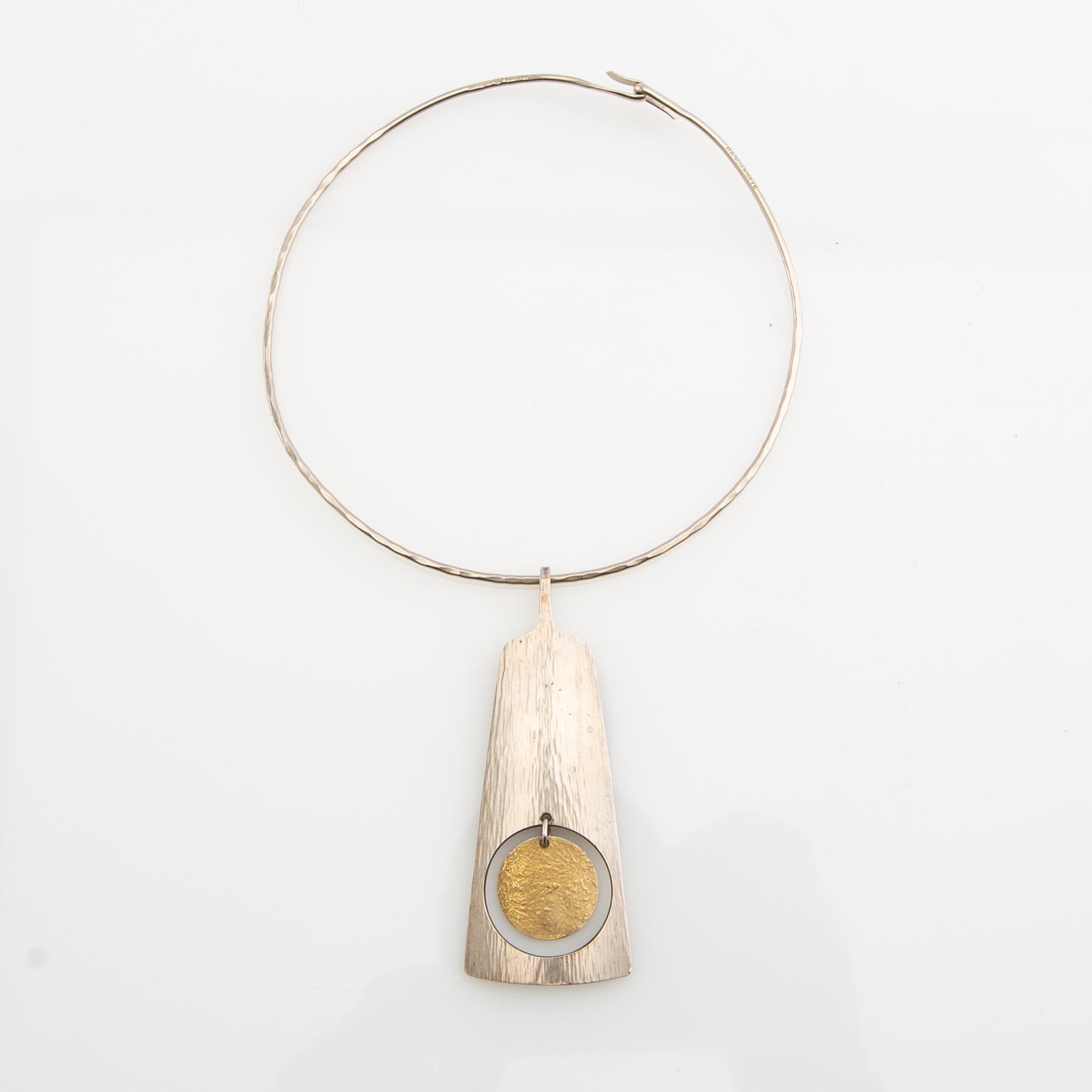 Neck ring, 18K white gold, Pernlos Gold & Silversmithing, 1976, Malmö, and pendant, sterling silver, Hans Hansen, Denmark.
