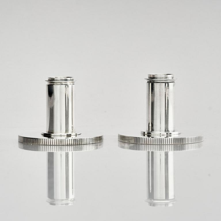 Georg Jensen, a pair of sterling silver candlesticks, design by Sigvard Bernadotte, model no 711A, Copenhagen, Denm after 1945.