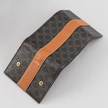 Céline, a canvas and leather handbag and wallet, 2020.