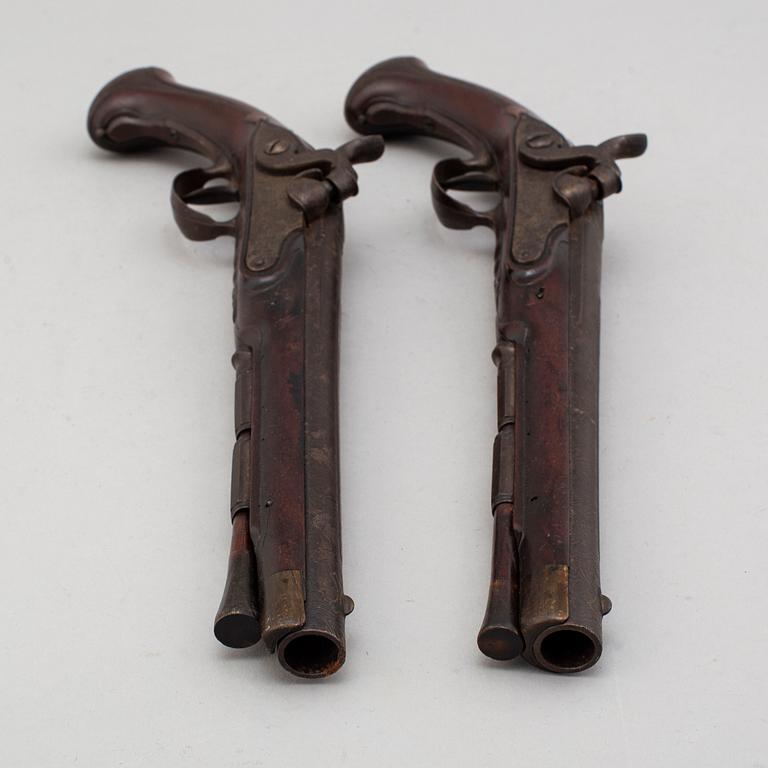 A pair of converted percussion pistols by Johan Franz Meidinger (Stockholm 1750-1769).