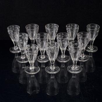 Twelve early 19th century wine glasses.