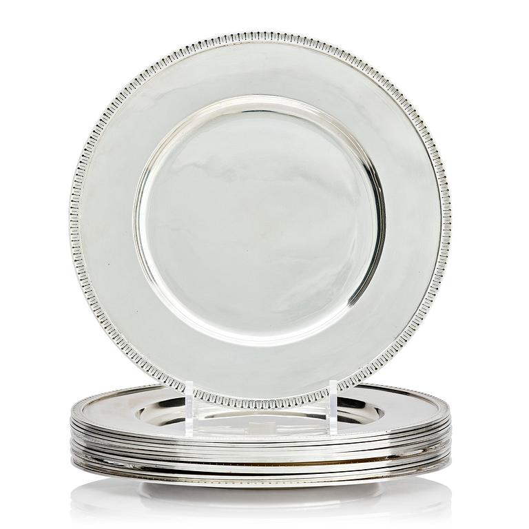 Victor Mossberg, a set of twelve silver plates, Stockholm, 1953-55.