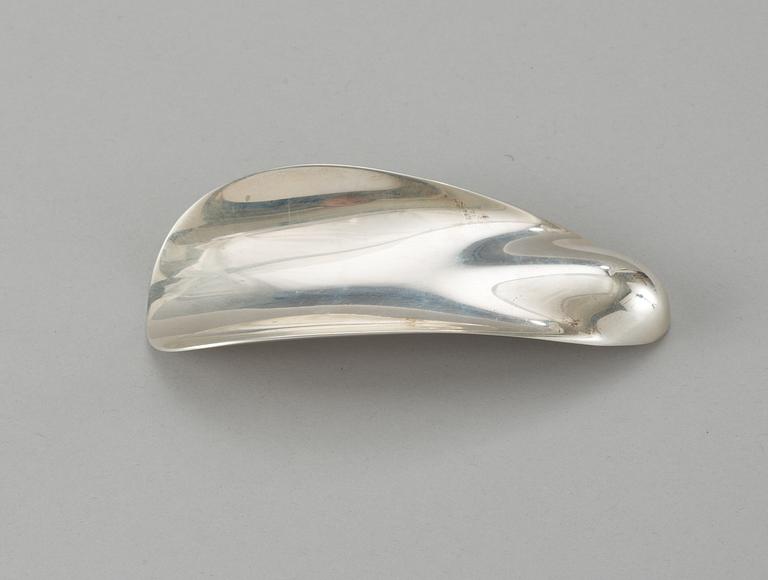 A Georg Jensen sterling shoehorn, design Allan Scharff, model 475.