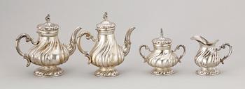 KAFFE- OCH TESERVIS, 4 delar, silver, rokokostil, troligen Tyskland, 1900-talets första hälft. Totalvikt ca 930 gram.
