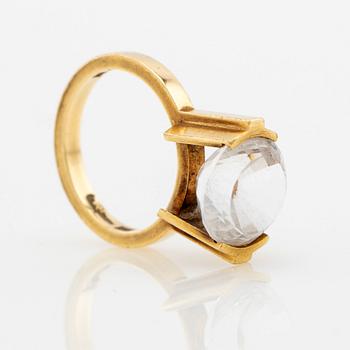 Wiwen Nilsson, Ring 18K gold with a round faceted rock crystal, Lund, 1968.