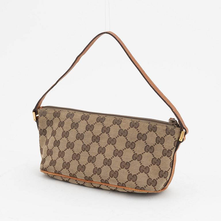 Gucci, a monogram canvas bag.