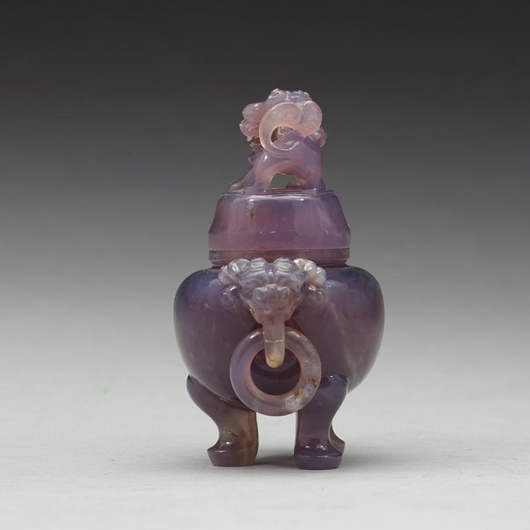 An amethyst tripod censer with cover, China, early 20th Century.