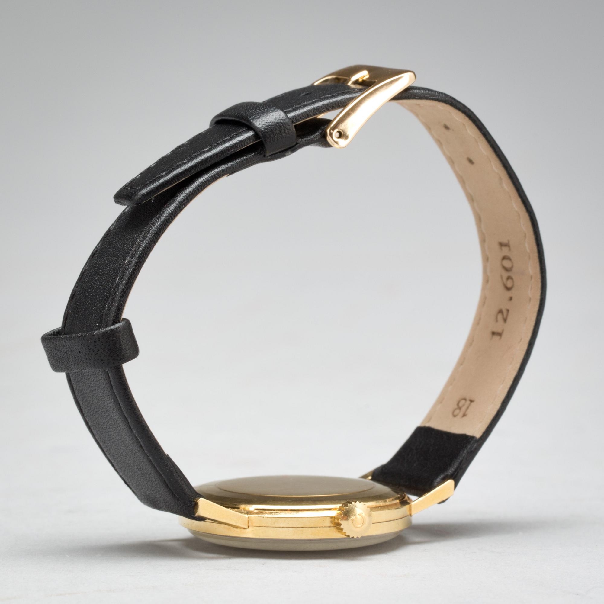 ARMBANDSUR, herr. Omega. 18K.