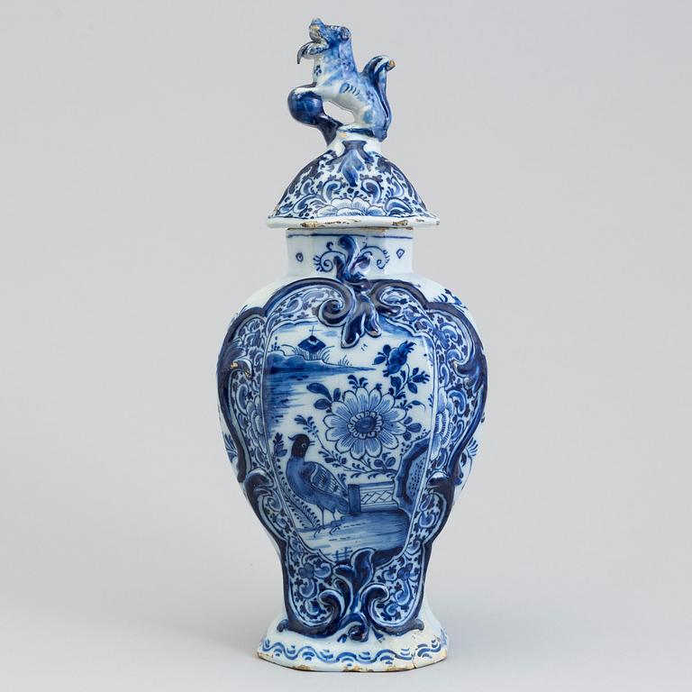 A lidded faience urn, Delft, The Netherlands, 18th century.