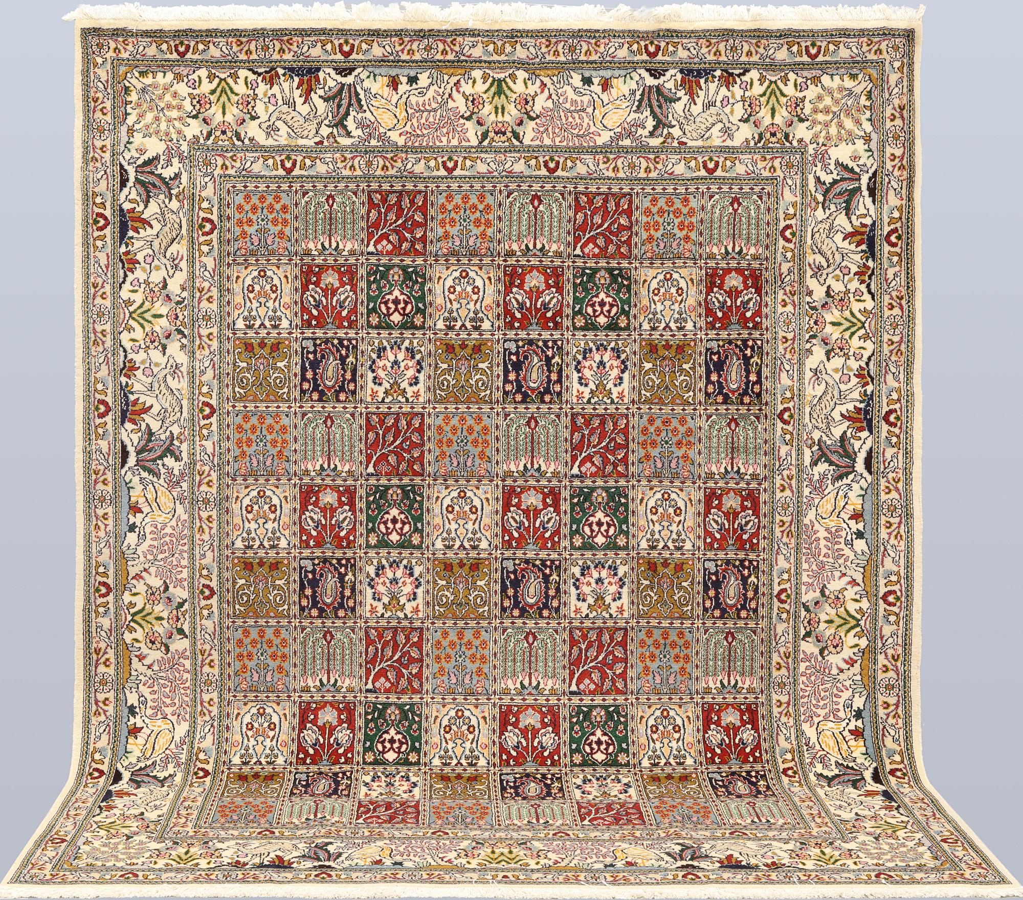 A part silk Moud rug, approx. 250 x 199 cm.