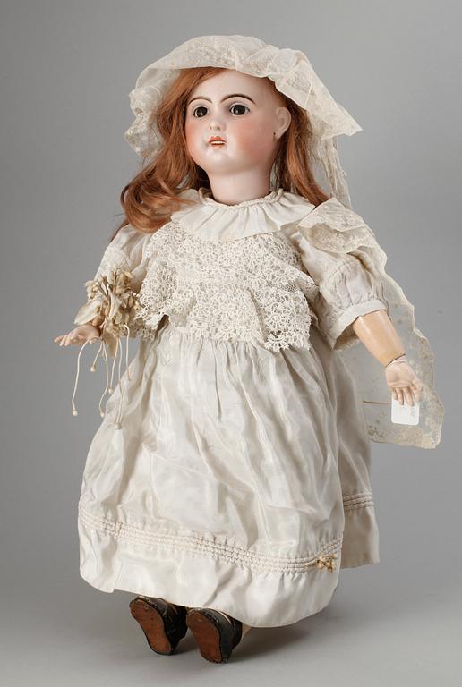 A French bisquit doll,marked Jumeau 1907.