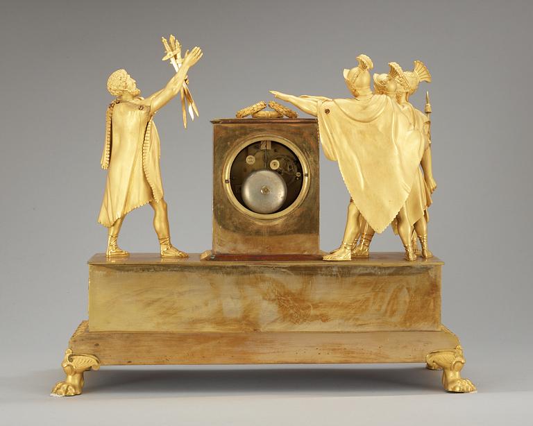 A French Empire early 19th Century gilt bronze mantel clock "Oath of the Horatii".
