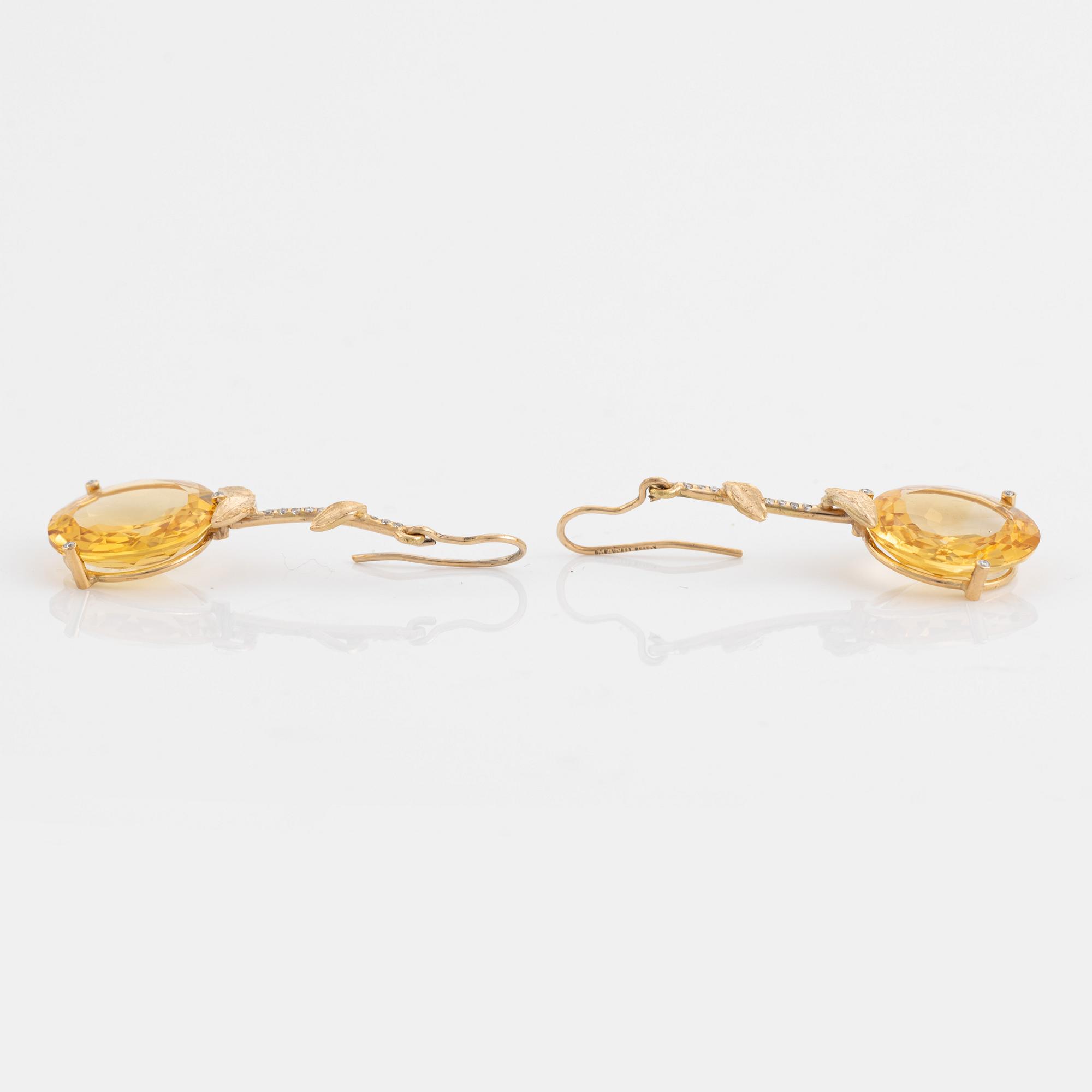 Large citrine and brilliant cut diamond earrings.