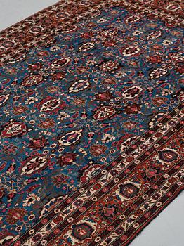 A carpet, semi-antique Veramin, ca 312-315 x 208,5-211,5 cm.