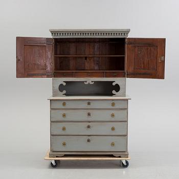 A first half of the 19th century cabinet.