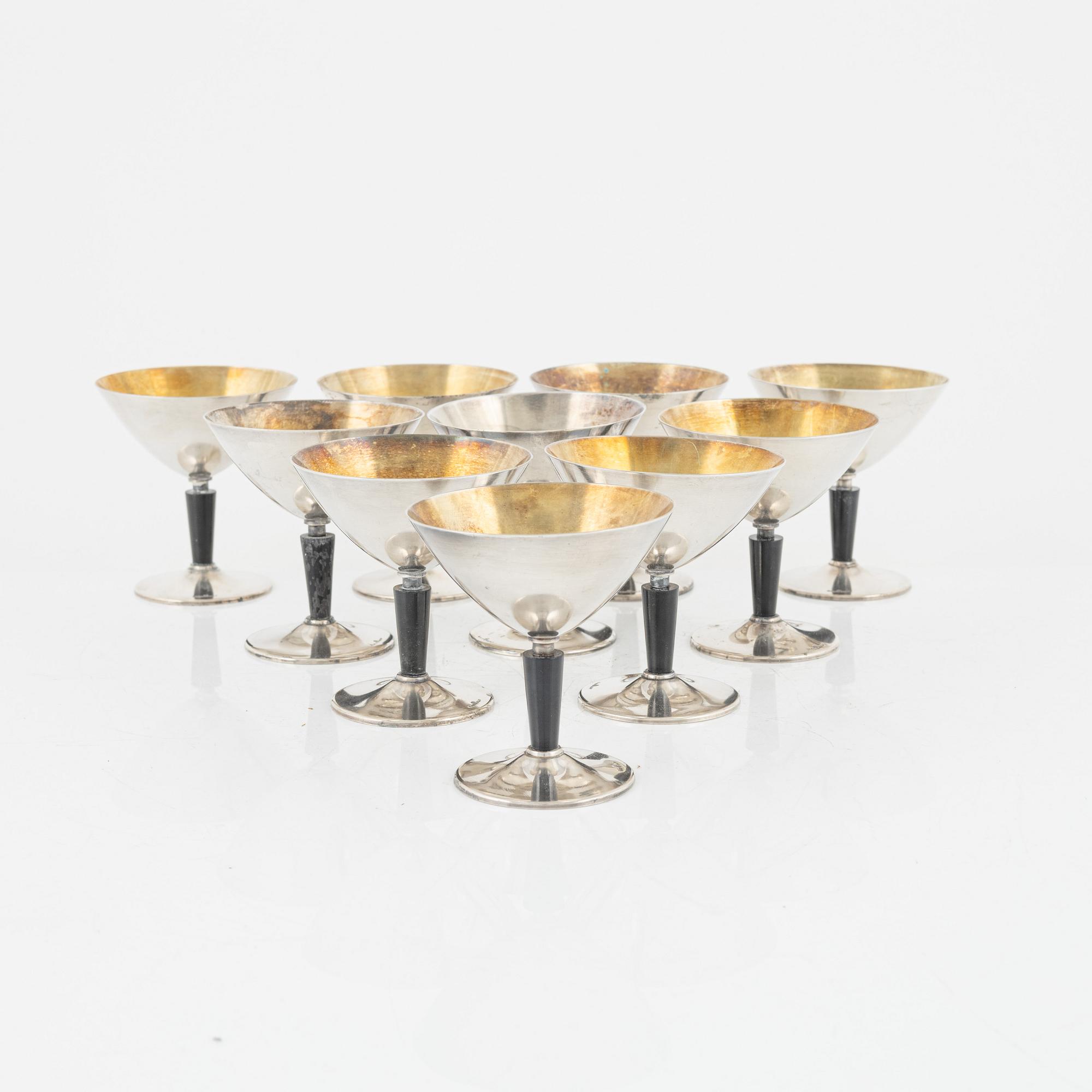 Folke Arström, ten silver plated cocktail glasses, GAB.