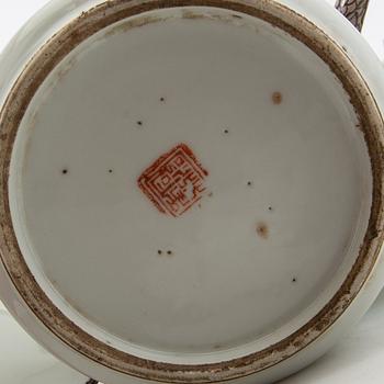 A set of three differently decorated tea pots with covers, Qing dynasty, 18century and 20th century.