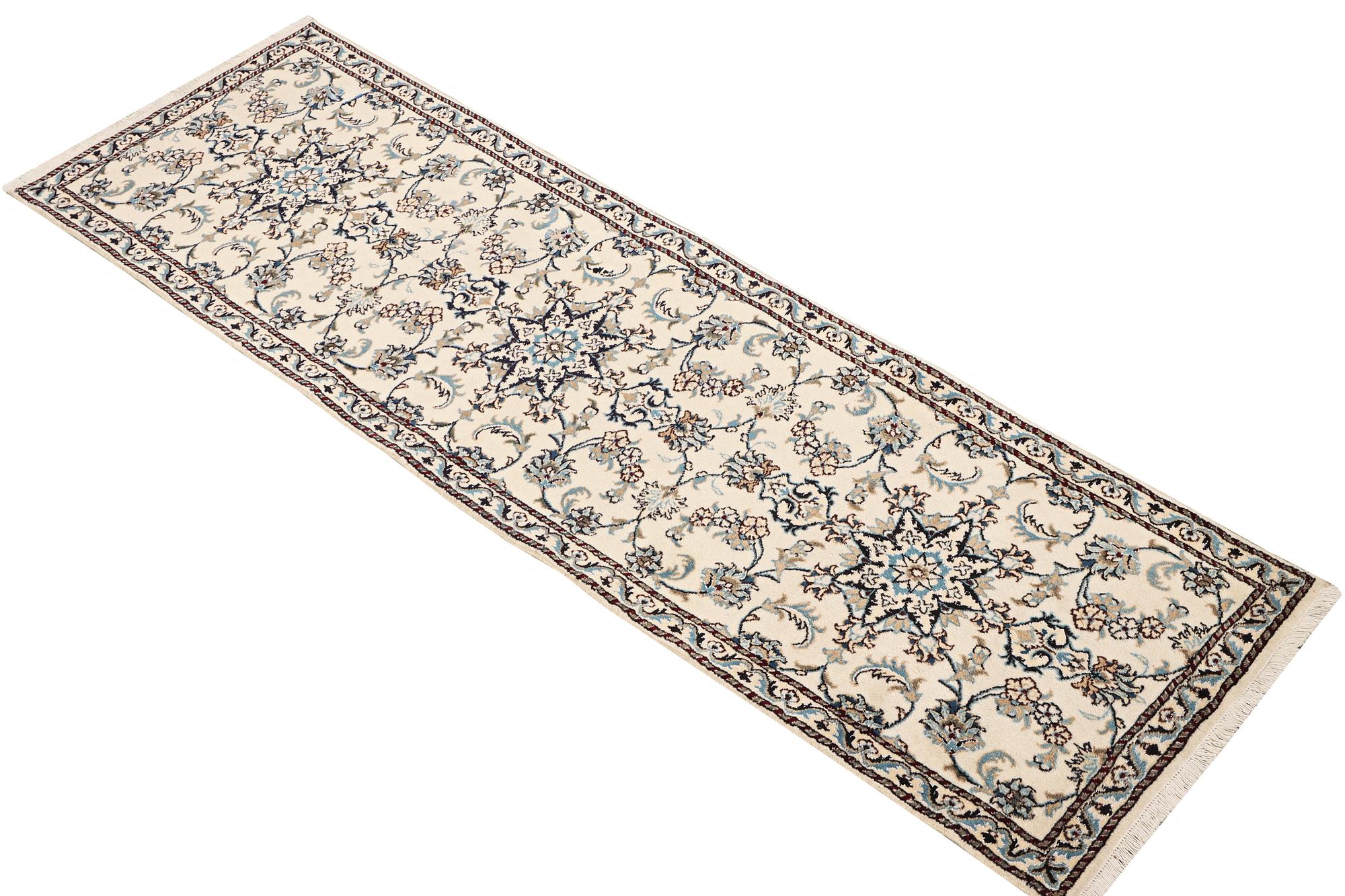 A Nain runner carpet, part silk, c. 298 x 80 cm.