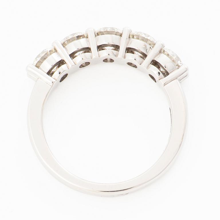 18K white gold half eternity ring with brilliant-cut diamonds.