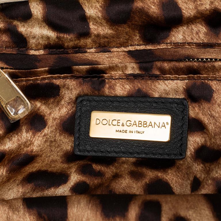 DOLCE & GABBANA, a satin clutch.