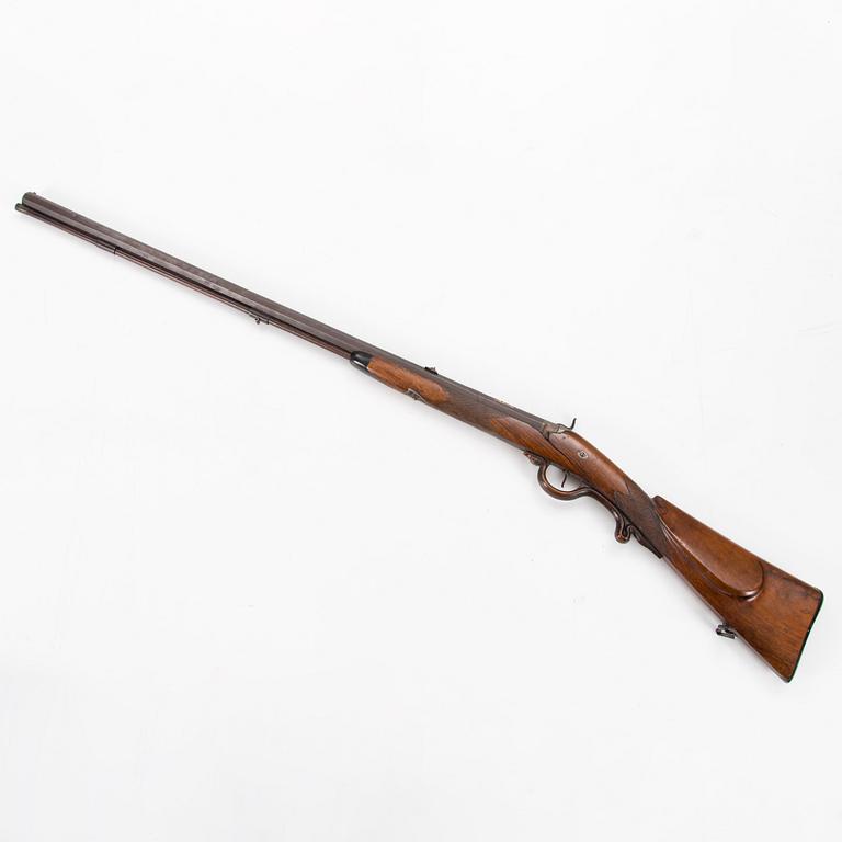 A mid 19th Century percussion rifle.