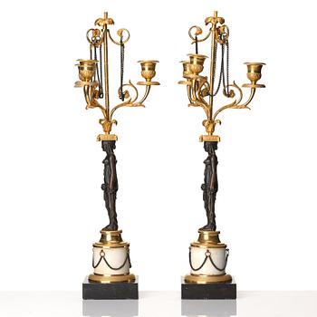 A pair of late Gustavian circa 1800 three-light candelabra, attributed to F L Rung.