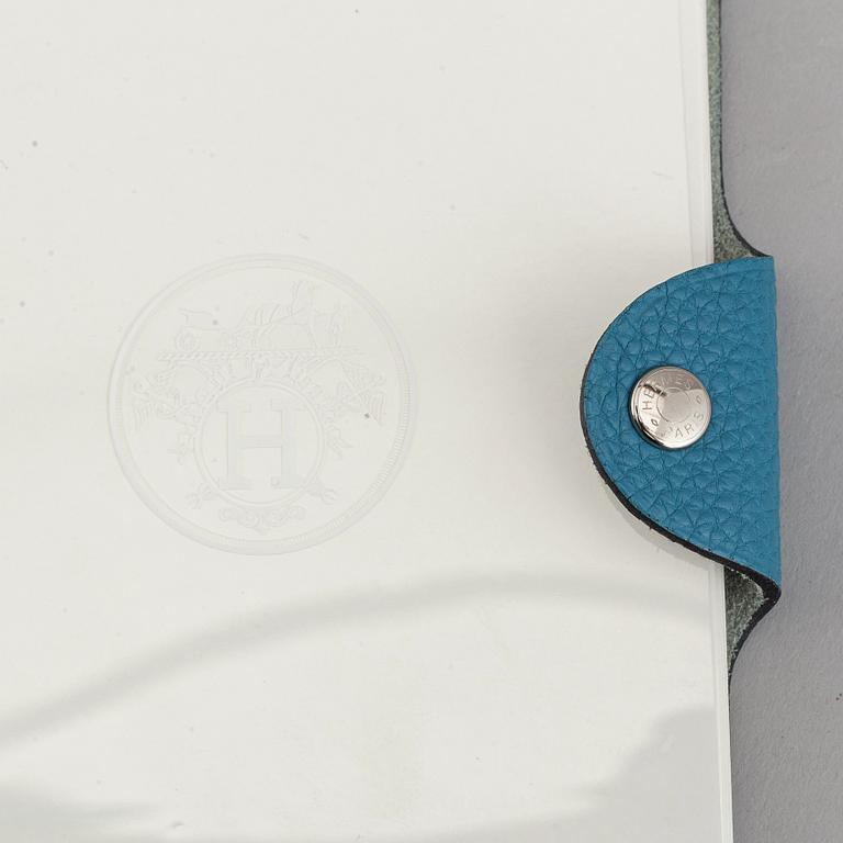 Hermès, a blue leather notebook with two scripple pads.
