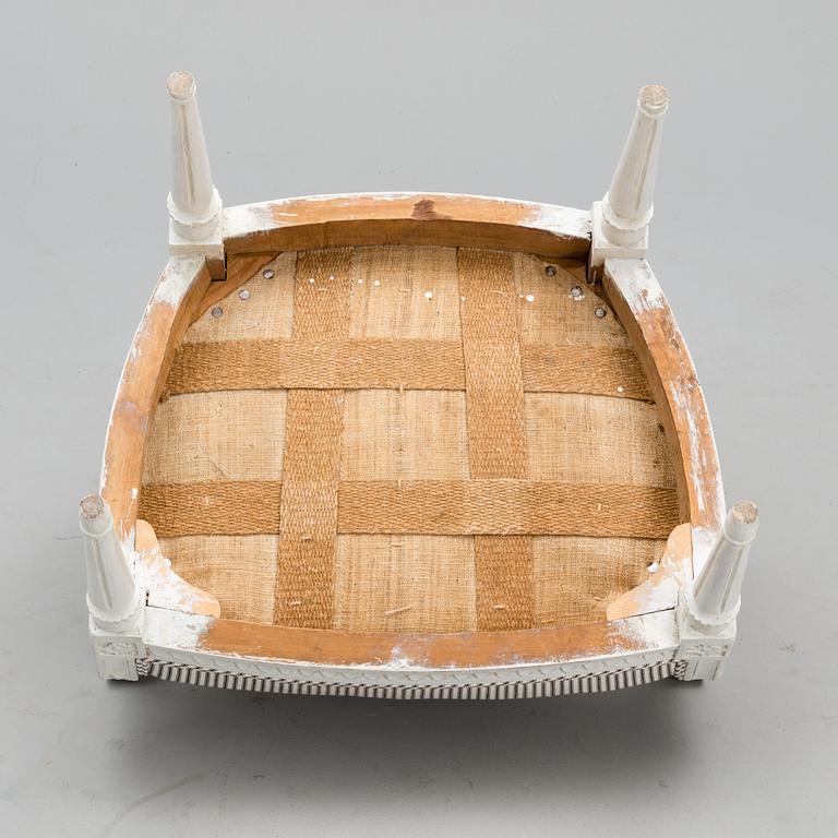 A late 18th century Swedidh Gustavian open arm chair.