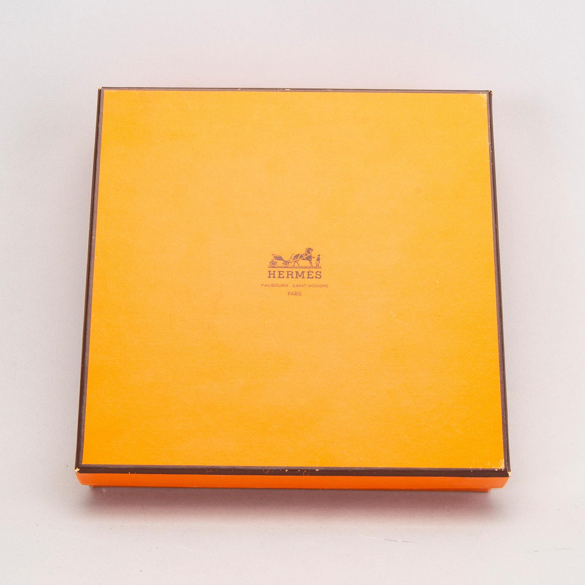 Hermès a set of four porcelain ashtrays later part of the 20th century.