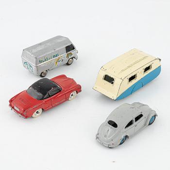 Nine toy cars, mostly Dinky toys.