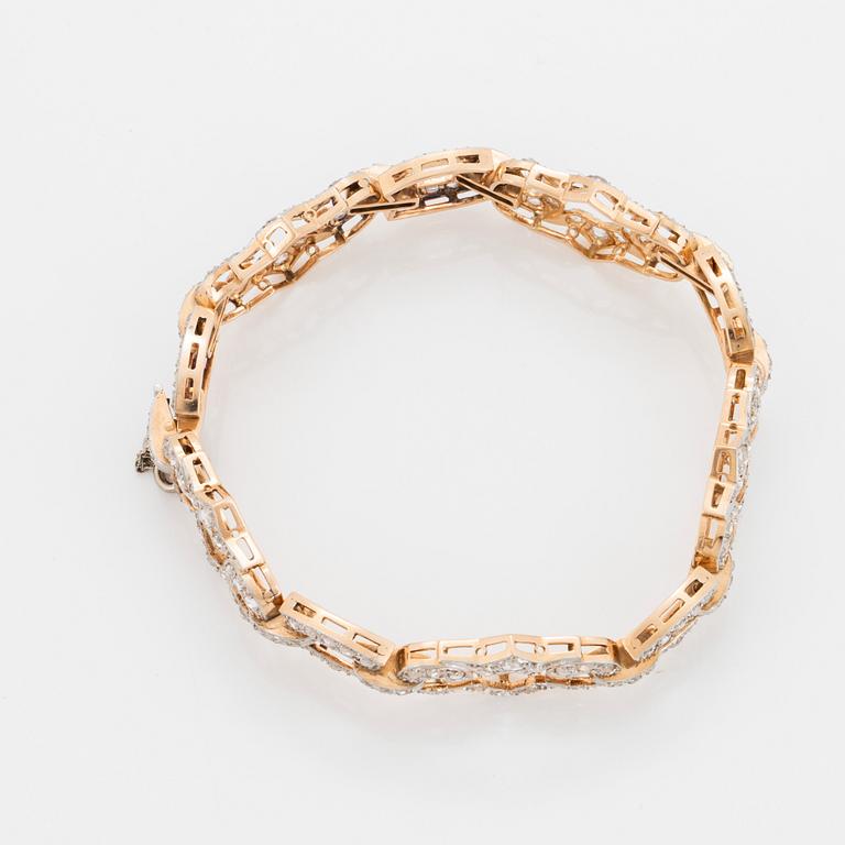 A 14K gold and platinum bracelet set with rose-cut diamonds.