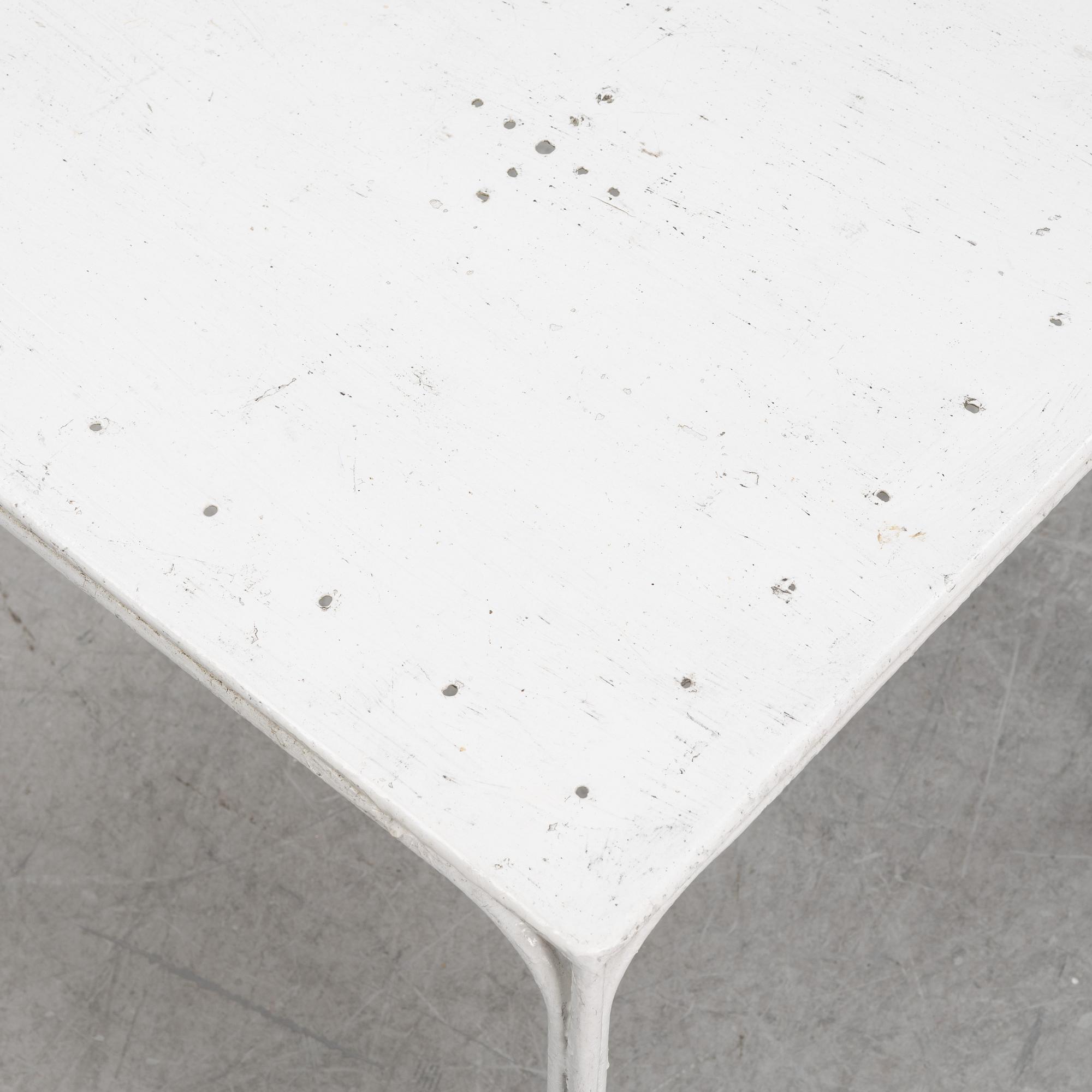 Four painted cast iron chair and table, mid/first half of the 20th century, Sweden.