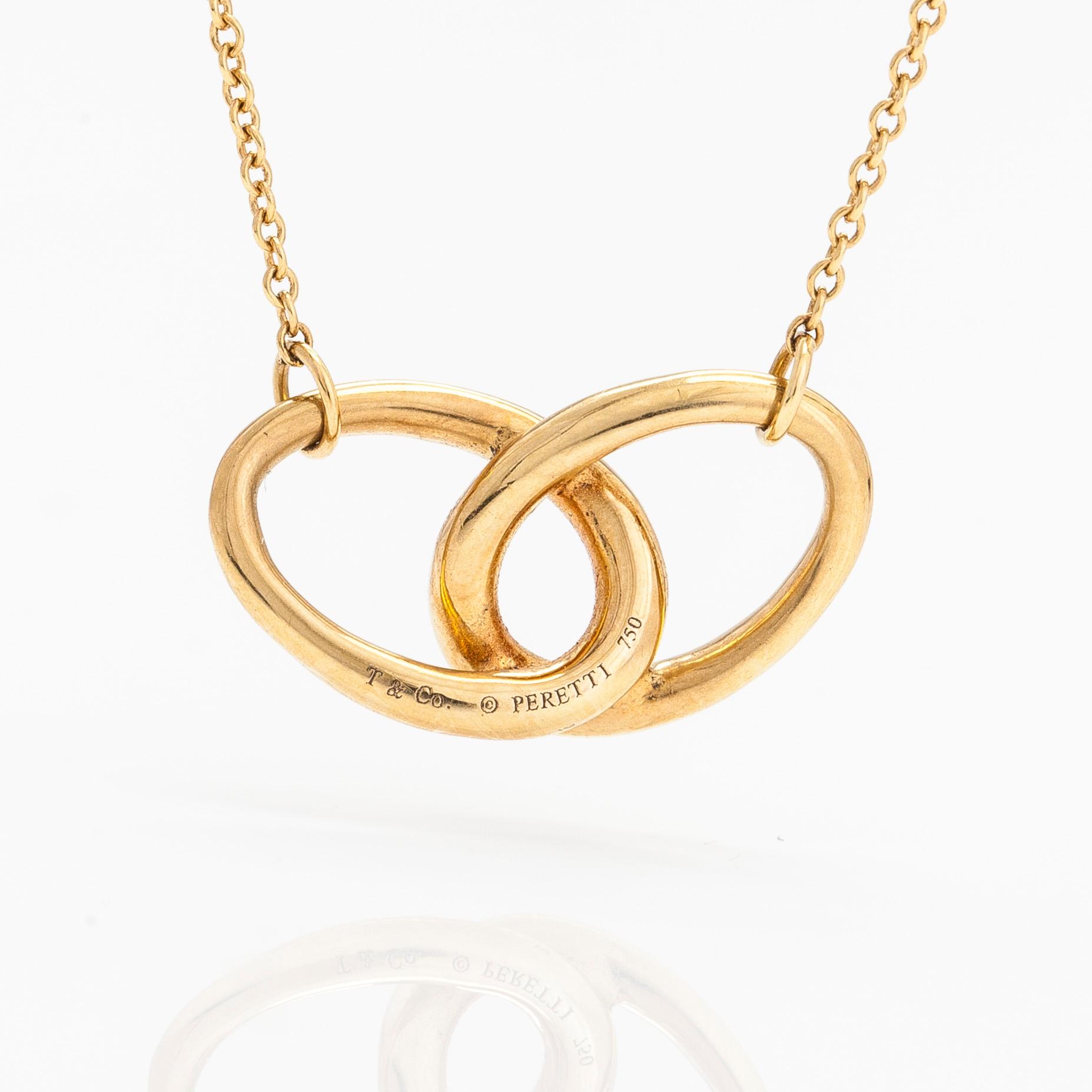 Tiffany & Co, Elsa Peretti, an 18K gold 'Double Loop' necklace.