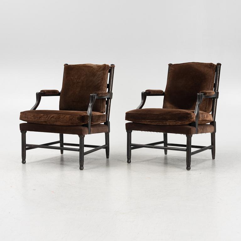 A pair of stained oak Gripsholm model armchair, late 20th Century.