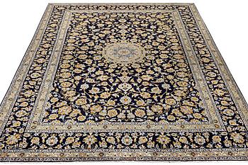 A Keshan carpet, c. 365 x 259 cm.