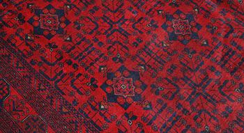 A Afghan fine carpet, 297 x 205 cm.