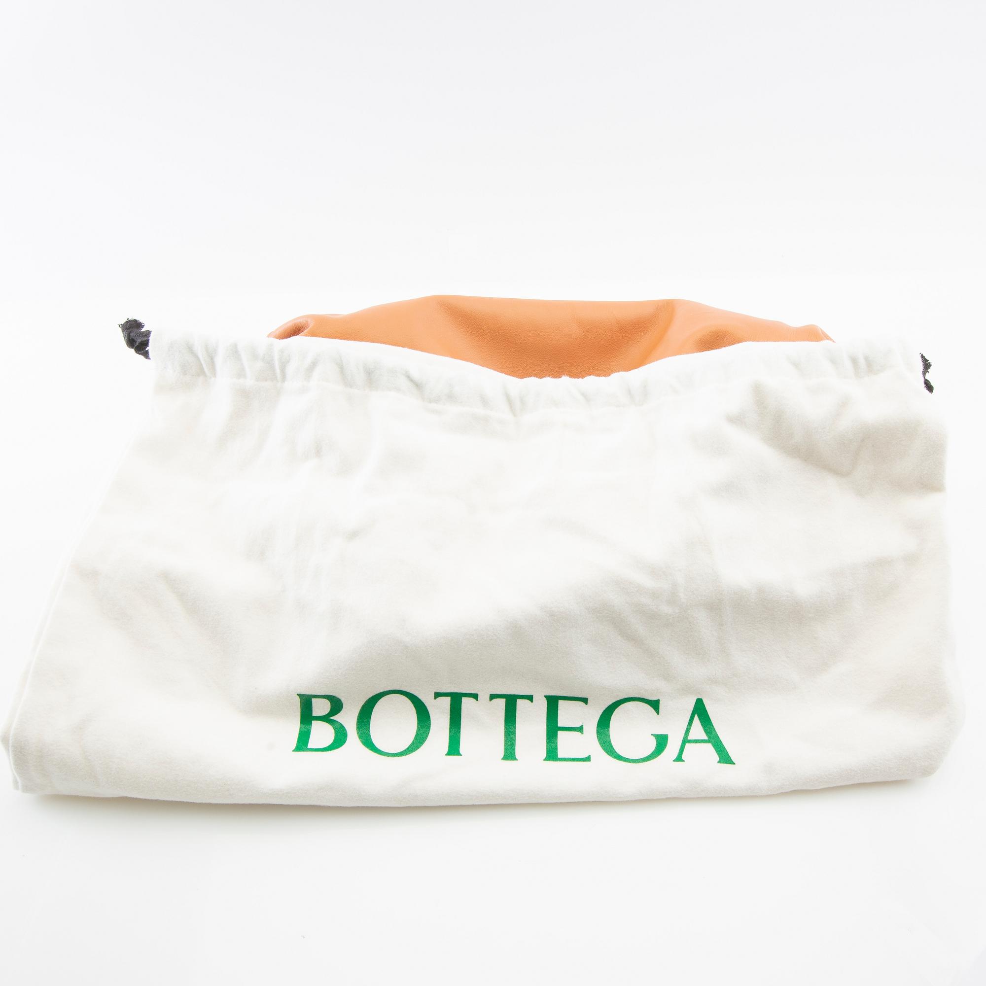 Bottega Veneta, "Pouch Clutch".