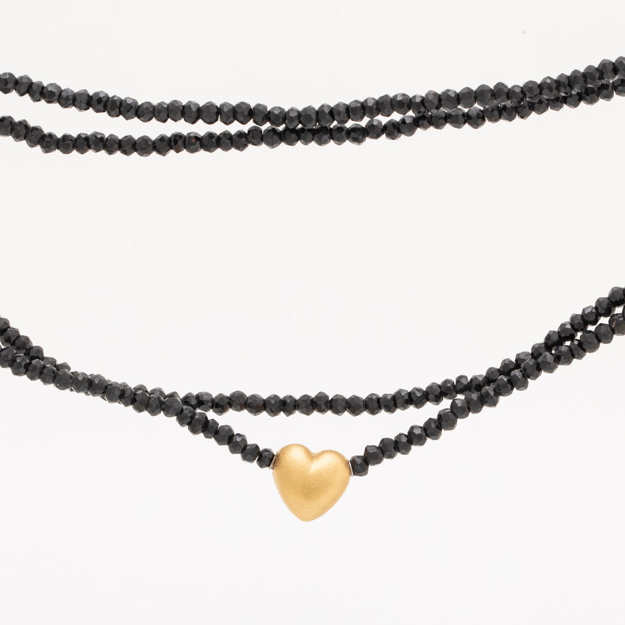 Ole Lynggaard, necklace faceted onyxbeads and clasp 18K gold, dustbag and original case.