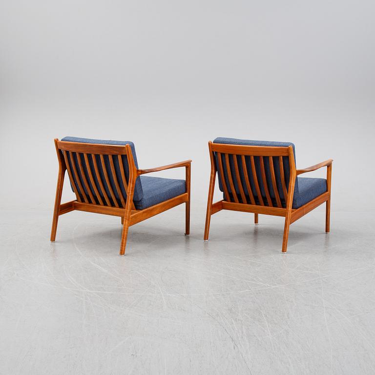 Folke Ohlsson, a pair of teak 'USA 75' easychairs, Dux, designed in 1963.