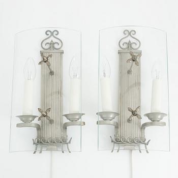 A pair of pewter Swedish Grace wall lights, 1920's.