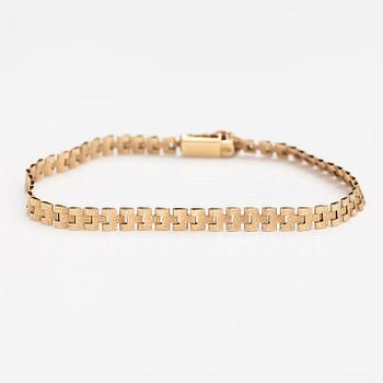 Rannekoru, 14K kultaa. Keravan Kultaseppä, Helsinki 1973.