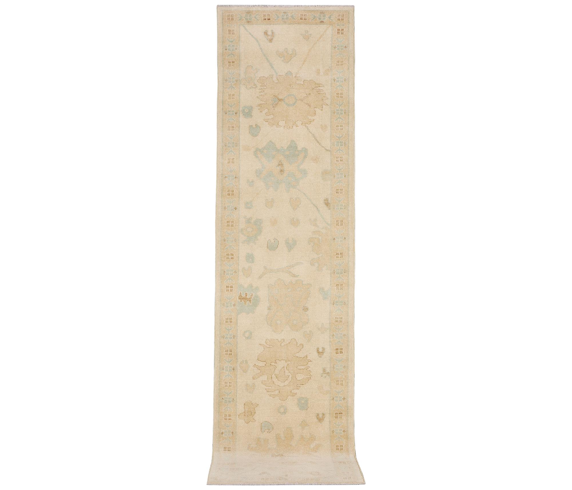 An Ushak runner carpet, c. 360 x 80 cm.