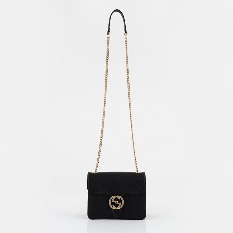 Gucci, a black leather 'Interlocking G' bag.